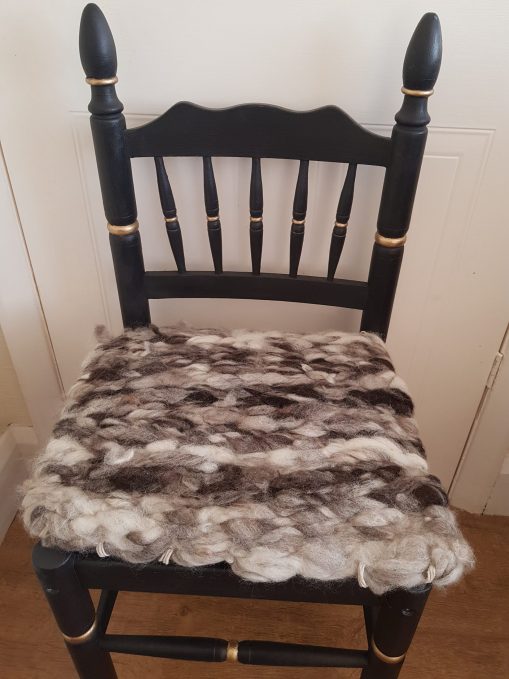 dark jacpb sheep peg rug seat pad